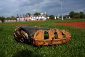 Baseball glove in field.